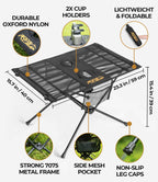 RoosCamp Portable Camping Table features diagram showing dimensions 23.3 x 15.7 x 15.4 inches, durable Oxford nylon, 2x cup holders, strong 7075 metal frame, side mesh pocket, non-slip leg caps and lightweight foldable carry bag