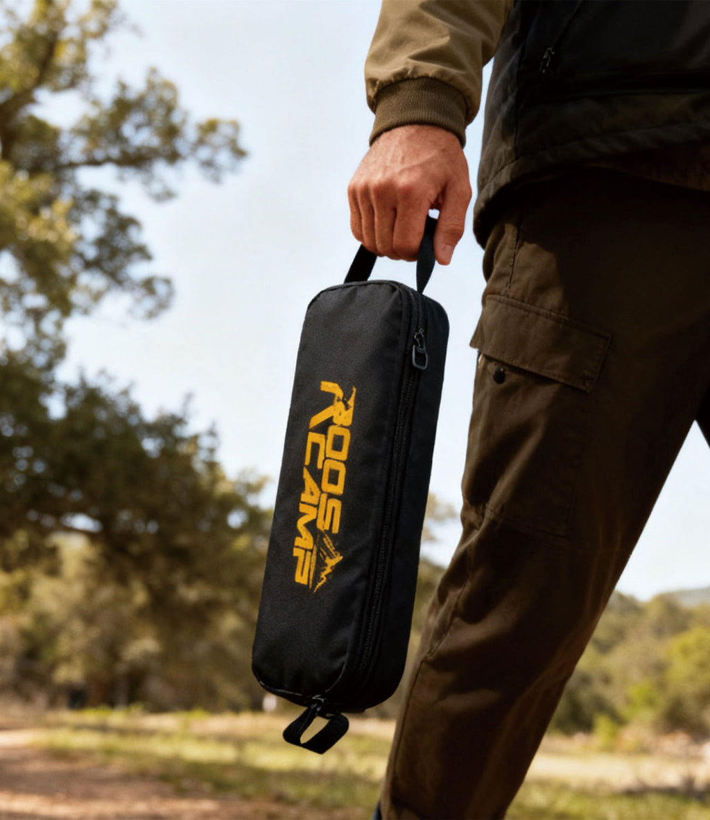 RoosCamp Portable High-Back Camping Chair carry bag being held by hand outdoors