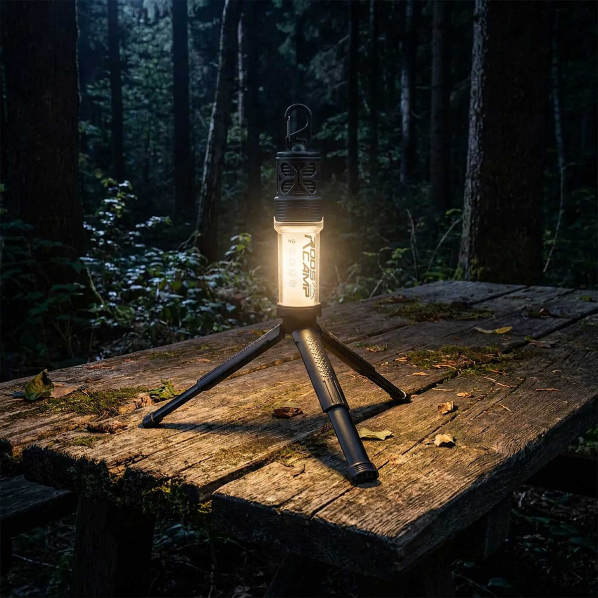 RoosCamp RoosRepel 3-in-1 mosquito repellent lantern mounted on included compact tripod stand on a table outdoors, showing 360-degree mosquito protection zone